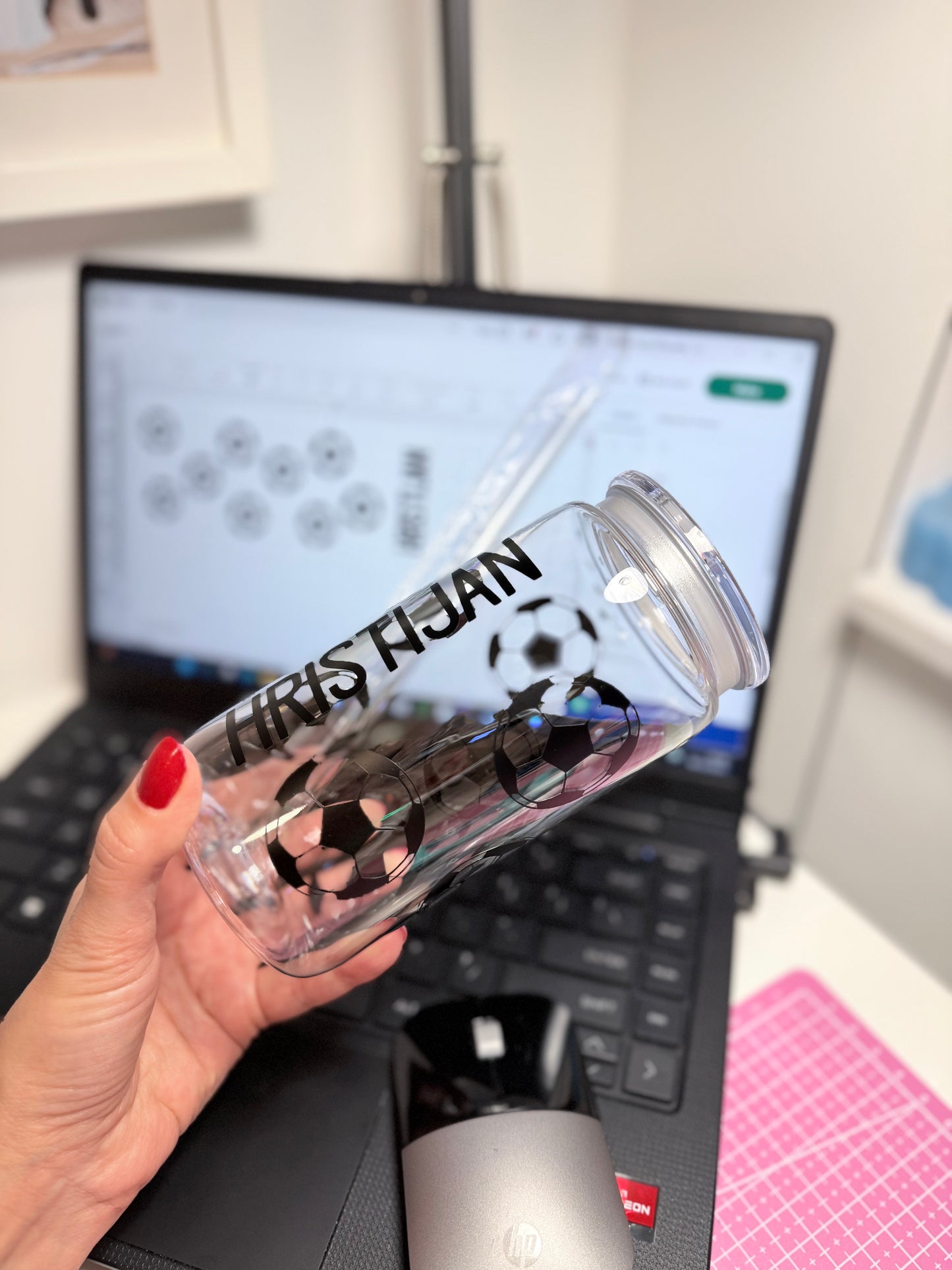 Plastic cup with lid and straw